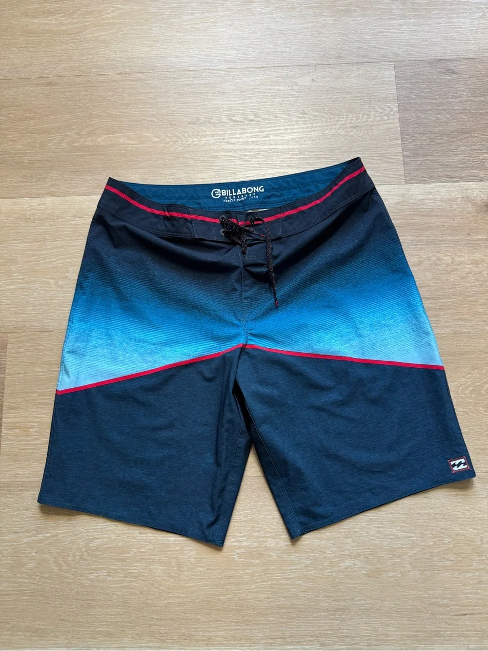 Billabong Navy and Teal Gradient Boardshorts with Red Trim
